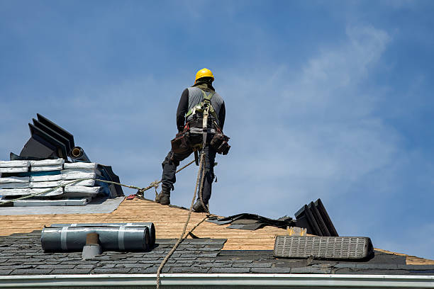 Professional Roofing technician working in Tiffin, IA